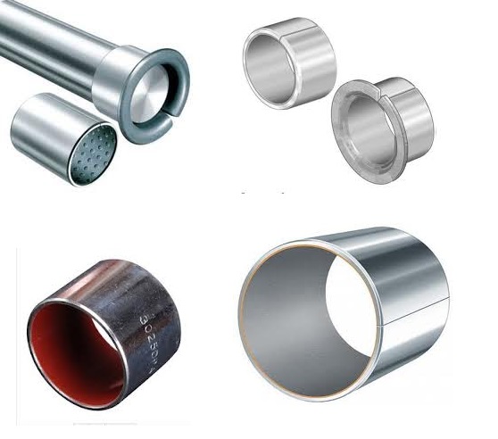 Tulejki ślizgowe, tuleje samosmarne, tuleje ślizgowe Tulejki Ślizgowe, Tulejki Samosmarne i Panewki – Przewodnik po Świecie Łożysk Ślizgowych Opis zdjęcia: Zdjęcie prezentuje szeroki asortyment kluczowych komponentów mechanicznych: tulejki ślizgowe, tulejki samosmarne oraz panewki ślizgowe. Elementy ułożone są na neutralnym tle, co pozwala dokładnie przyjrzeć się różnicom w ich budowie, materiale wykonania i wykończeniu. Widzimy tu zarówno klasyczne, jednolite tuleje z brązu o złotawym połysku, nowoczesne tuleje polimerowe, jak i precyzyjne, dwudzielne panewki stalowo-kompozytowe. Różnorodność form – od prostych cylindrów po tuleje kołnierzowe i półpierścienie – doskonale ilustruje szerokie zastosowanie tych części w przemyśle. 1. Tulejki Ślizgowe – Niezawodna Podstawa Tulejki ślizgowe, często nazywane po prostu łożyskami ślizgowymi, to podstawowy i wszechstronny typ łożyska. Na zdjęciu widoczne są jako: Tuleje z brązu lub stali: Charakteryzują się jednolitą, metaliczną strukturą. Wymagają regularnego smarowania za pomocą oleju lub smaru stałego, aby zminimalizować tarcie i zużycie. Tuleje zwijane (Permaglide, Glycodur): Wykonane z taśmy stalowej pokrytej warstwą ślizgową (np. brąz spiekany z PTFE). Rozpoznawalne po charakterystycznym wzdłużnym nacięciu. Łączą wysoką wytrzymałość mechaniczną z dobrymi właściwościami ślizgowymi. 2. Tulejki Samosmarne – Technologia Bezobsługowa Grupa ta stanowi nowoczesne rozwiązanie problemu smarowania. Tuleje samosmarne (nazywane też łożyskami bezobsługowymi lub suchoślizgowymi) zawierają smar w swojej strukturze, co eliminuje potrzebę zewnętrznego smarowania. Na zdjęciu można wyróżnić: Tuleje ze spieków brązu (np. Bimet, Brąz Spiekany): Posiadają porowatą strukturę nasączoną olejem, który jest uwalniany podczas pracy. Mają matowy, miedziany wygląd. Tuleje z wkładkami grafitowymi: W litej tulei (najczęściej z brązu) osadzone są korki z grafitu, który pełni funkcję smaru stałego. Idealne do pracy w wysokich temperaturach i przy niskich prędkościach. Tuleje polimerowe (np. z iglidur®, teflonu): Wykonane w całości z zaawansowanych tworzyw sztucznych z dodatkami smarującymi. Są lekkie, odporne na korozję i chemikalia, a także doskonale tłumią drgania. 3. Panewki Ślizgowe – Precyzja w Najtrudniejszych Warunkach Panewki ślizgowe to specjalistyczny typ łożyska, najczęściej stosowany w silnikach spalinowych do osadzania wałów korbowych i korbowodów. Ich kluczowe cechy to: Konstrukcja dwudzielna: Składają się z dwóch precyzyjnych połówek (półpanewek), co umożliwia montaż na złożonych wałach. Budowa wielowarstwowa: Zazwyczaj składają się ze stalowego płaszcza nośnego pokrytego specjalnym stopem łożyskowym, który zapewnia niskie tarcie i odporność na zatarcia. Zastosowanie: Kluczowe dla motoryzacji (panewki główne, panewki korbowodowe) oraz w ciężkich maszynach przemysłowych.